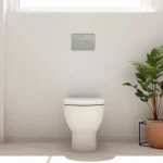 Installazione di un copri wc elegante in un bagno moderno con accessori coordinati.